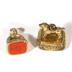 Gilt metal poodle seal and a cherub gilt m…