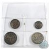 Image 1 : Great Britain; 1902 4-coin Maundy set. This is the first year of Edward VII. All coins have even ton