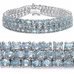 STERLING SILVER BLUE TOPAZ TRIPLE ROW BRACELET