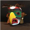 Image 2 : GENE BRABANT, "KWAG-UITLH EAGLE" HAND CARVED AND PAINTED MASK WITH FEATHER AND CEDAR BARK ACCENTS,
