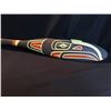 Image 2 : HARVEY JOHN, HAND CARVED AND PAINTED RAVEN PADDLE, WITH ABALONE INLAY, SIGNED BY ARTIST ON BACK,