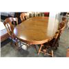 Image 2 : SOLID OAK PEDESTLE TABLE WITH LEAF AND FOUR CHAIRS