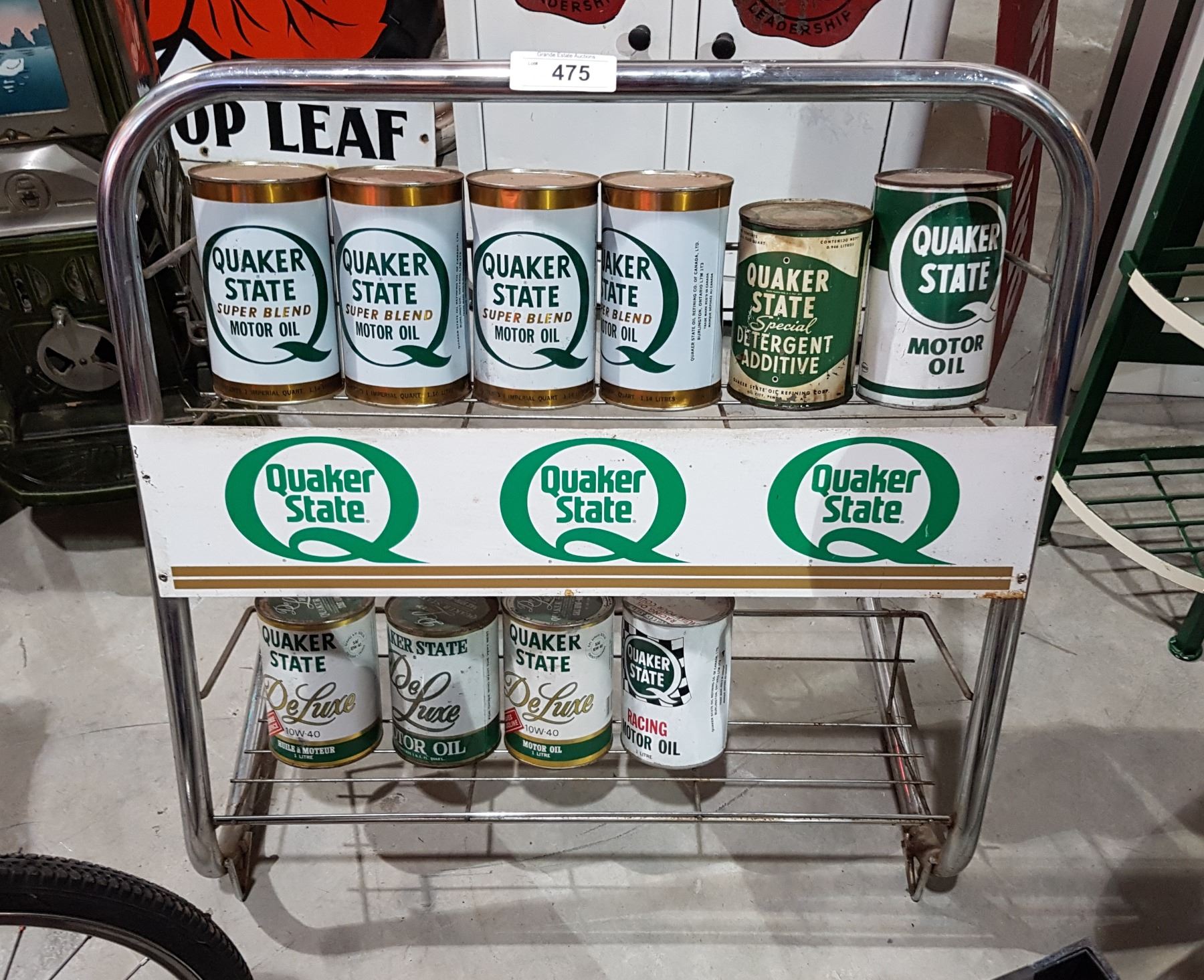QUAKER STATE OIL RACK W/9 FULL OIL QUARTS