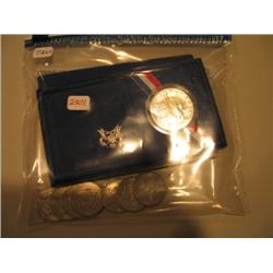 LOT, 1986 COMMON COINS, (8) HALF DOLLARS & (2) $2 NOTES