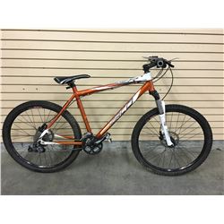 ORANGE NORCO CHARGER FRONT SUSPENSION MOUNTAIN BIKE WITH FRONT AND REAR HYDRAULIC DISK BRAKES, 20''