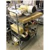 Image 1 : LARGE ASSORTMENT OF AUTOMOTIVE PARTS, INCLUDING RADIATOR, MANUALS AND MORE, ROLLING RACK NOT