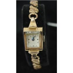 LADIES' 14K GOLD BULOVA WATCH