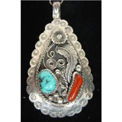 STERLING SILVER MEDALLION WITH TURQUOISE STONE