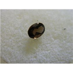 GEMSTONE - OVAL FACETED SMOKEY TOPAZ - 7.0 X 4.9 X 3.4 mm - ~  0.83CT