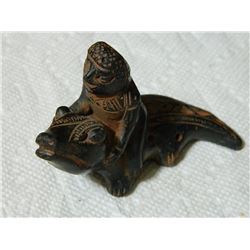 HAND CRAFTED CARVING - MAN ON SEAL? - INUIT? - 4 L X 2 3/4 H X 1 1/2" W