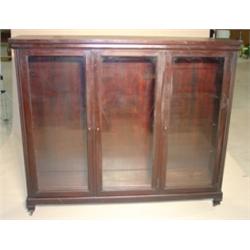 MAHOGANY THREE DOOR BOOKCASE
