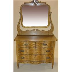 OAK SERPENTINE FRONT CHEST OF DRAWERS