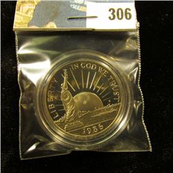 1986 S Proof 65 Statue of Liberty Commemorative Half-Dollar, encapsulated.