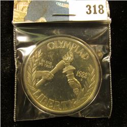 1988 S U.S. Olympics Proof Silver Dollar, encapsulated.