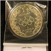 Image 2 : 1988 S U.S. Olympics Proof Silver Dollar, encapsulated.