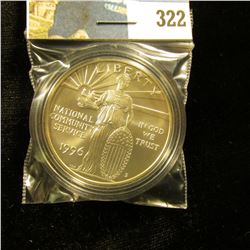 1996 S U.S. National Community Service GEM BU 69 Silver Dollar, encapsulated.