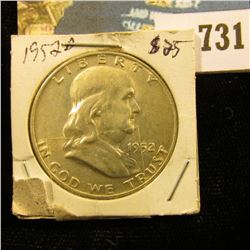 1952 D Franklin Half Dollar, Lightly toned Uncirculated.