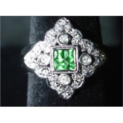 14 KT. WHITE GOLD GARNET & DIAMOND RING