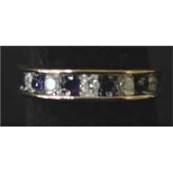 14 KT. YELLOW GOLD SAPPHIRE & DIAMOND RING