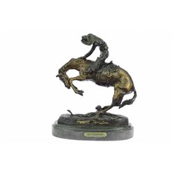 Cowboy on Horse Batteling a Rattle Snake Bronze Statue