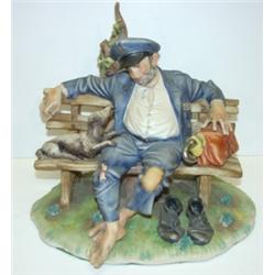 FIGURAL PORCELAIN STATUETTE OF VETERAN