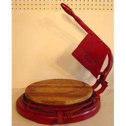 PRIMITIVE ROTATING CHEESE CUTTER