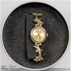 GIAN GIORGIO DOLPHIN BAND GOLD TONE WATCH.