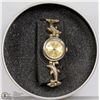 Image 1 : GIAN GIORGIO DOLPHIN BAND GOLD TONE WATCH.