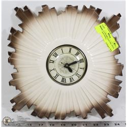 VINTAGE CERAMIC ELECTRIC WALL CLOCK. HAS SMALL