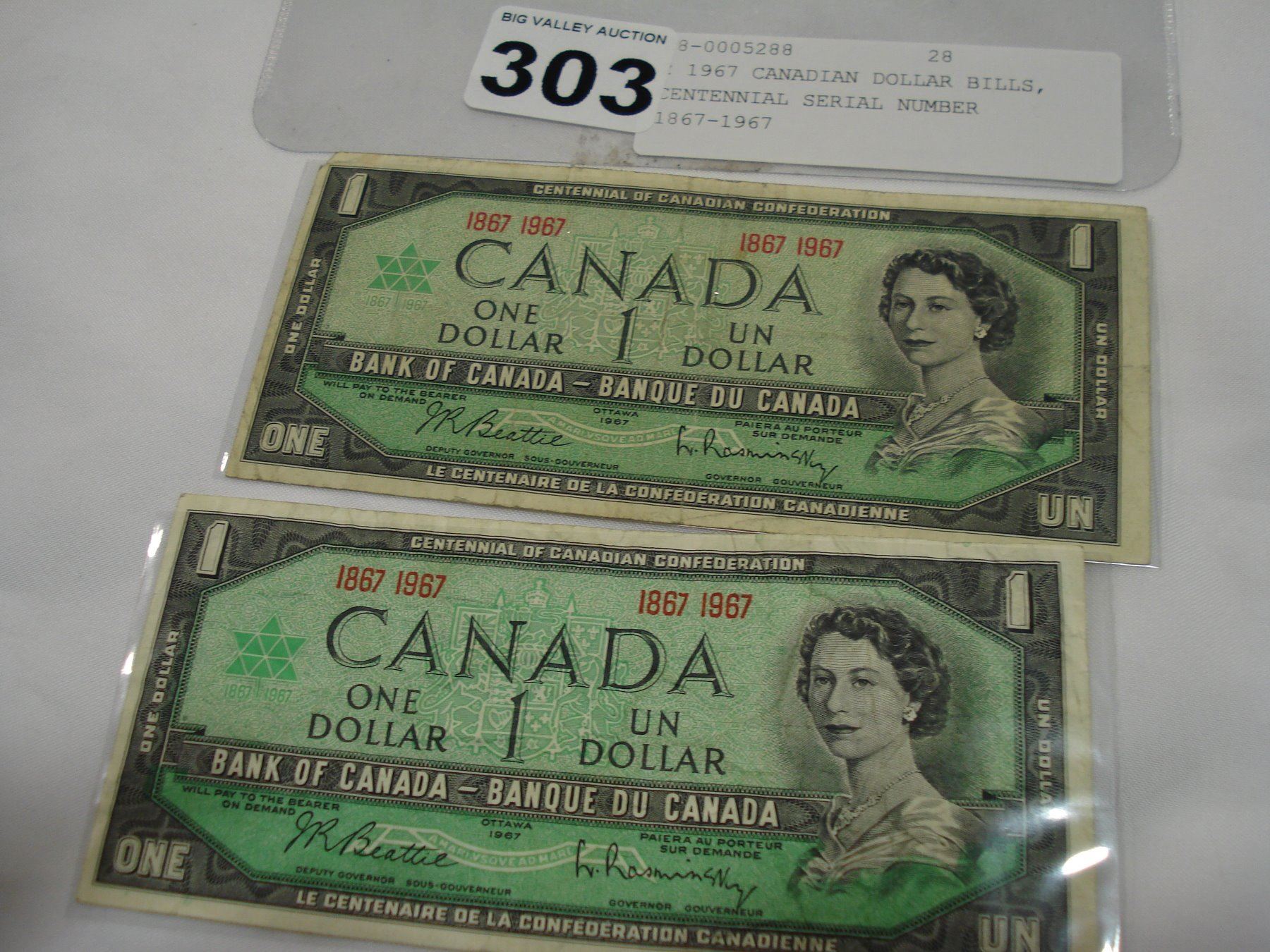 2 1967 CANADIAN DOLLAR BILLS CENTENNIAL SERIAL NUMBER 1867 1967 2-1967-canadian-dollar-bills-centennial-serial-number-1867-1967
