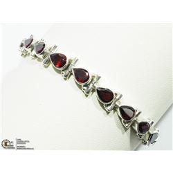 18) STERLING SILVER GARNET TENNIS BRACELET