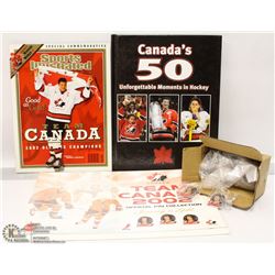 FLAT WITH TEAM CANADA PIN SET AND BOOK.