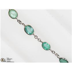 27) 10K WHITE GOLD EMERALD BRACELET