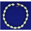 Image 1 : Natural Jade Bracelet in 14k Gold
