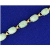Image 2 : Natural Jade Bracelet in 14k Gold
