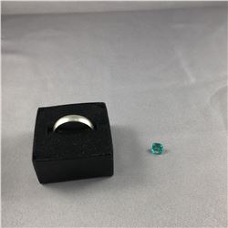 ONE LOOSE STEP NATURAL COLUMBIAN EMERALD 1.25 CARAT PACKAGED IN A PLEXIGLASS CONTAINER REPLACEMENT