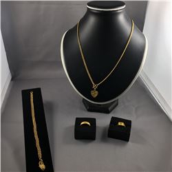 ONE 22-24KT YELLOW GOLD CHAIN 50CM LONG REPLACEMENT VALUE: $2500.00. ONE 22-24KT YELLOW GOLD HEART