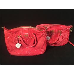 PAIR OF PINK COACH PURSES
