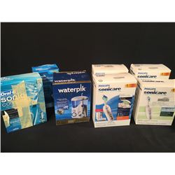 BAG OF ASSORTED ELECTRIC TOOTHBRUSHES & WATERPIKS