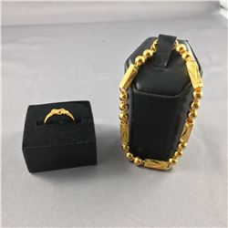 ONE 22-24KT YELLOW GOLD BALL AND BAR STYLE LINK BRACELET 19CM LONG.  WHICH HAS A TEXTURED FINISH