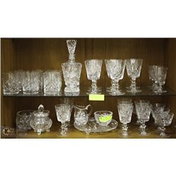 2 SHELVES OF PINWHEEL CRYSTAL GLASSES AND MORE.