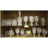 Image 1 : 2 SHELVES OF PINWHEEL CRYSTAL GLASSES AND MORE.
