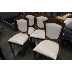 SET OF FOUR FLOOR MODEL CARVED DINING CHAIRS