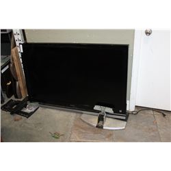 SONY 52 INCH LCD TELEVISION, WITH STAND AND FULL MOTION WALL MOUNT, WORKING, NO REMOTE