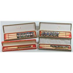 Collection of 4 sets of old chopsticks