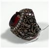 Image 2 : Silver and brass ring set with central red gemstone