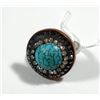 Image 1 : Silver and brass ring set with central turquoise gemstone