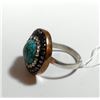 Image 2 : Silver and brass ring set with central turquoise gemstone