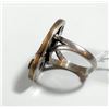 Image 2 : Silver and brass ring set with transparent gemstones and a green gemstone