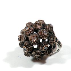 Ball-shaped silver and brass ring